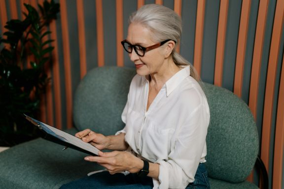 Woman holding a clipboard