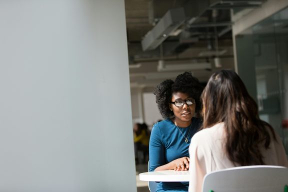 Two women talking to each other